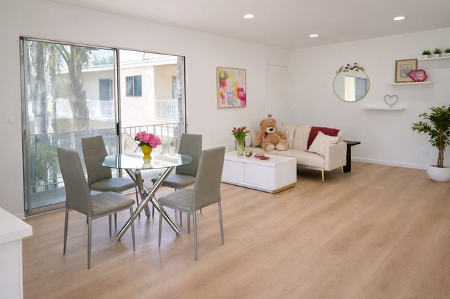 Wide Open Living Room with Balcony - 5860 Hazeltine Ave