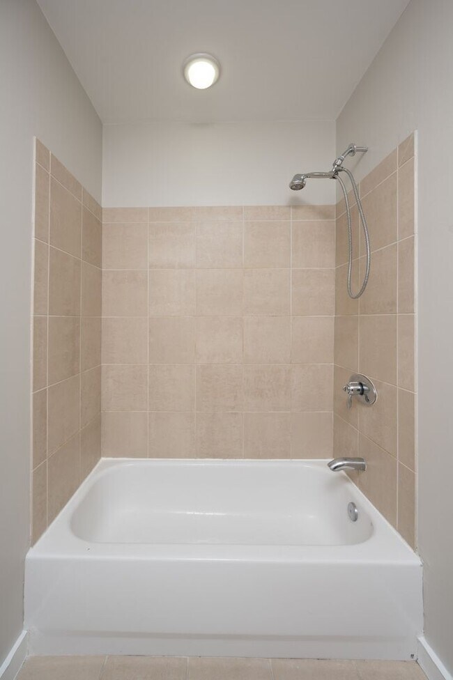 Building Photo - **WALKABLE MIDTOWN CONDO WITH BALCONY AND ...