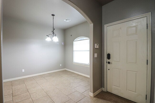 Building Photo - New vinyl plank in bedrooms, hall, new paint, new heat & air conditioning system 2025, large livi...