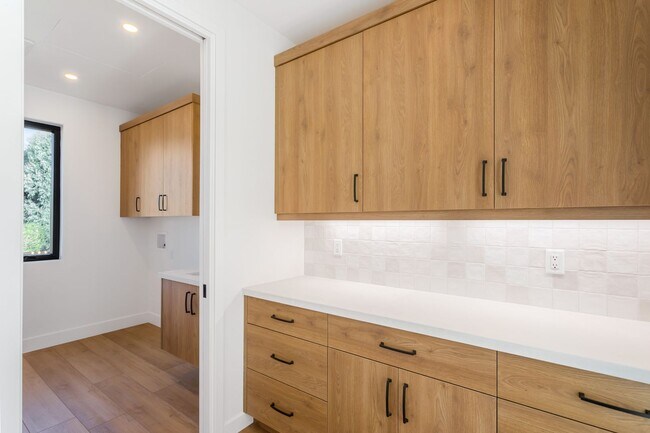 Building Photo - Luxurious Living in Rancho San Diego: Custom Built Home for Rent $5,095