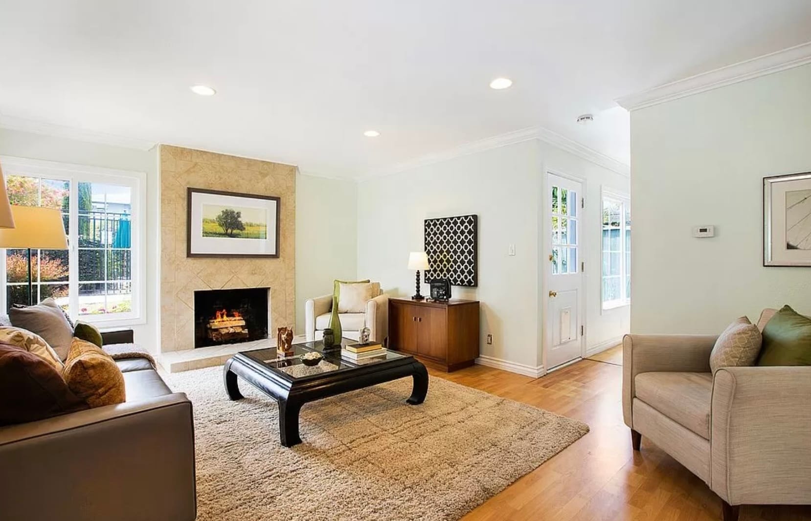Living room with fireplace. Door leads to patio - 1845 Anaheim Ave