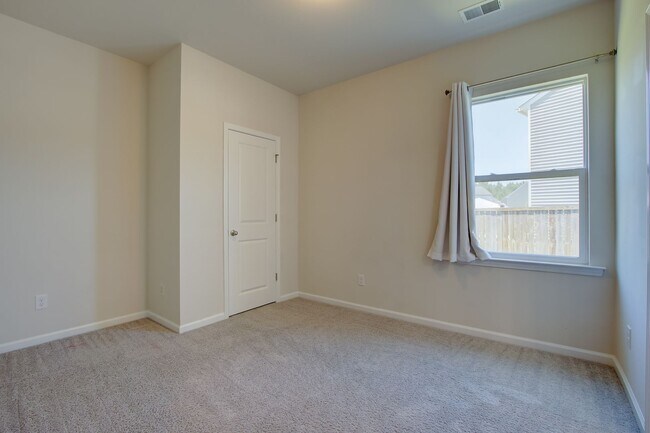 Building Photo - Spacious 4BR Rental with Stunning Kitchen & Covered Patio