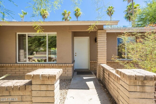Building Photo - 4077 E Cholla St