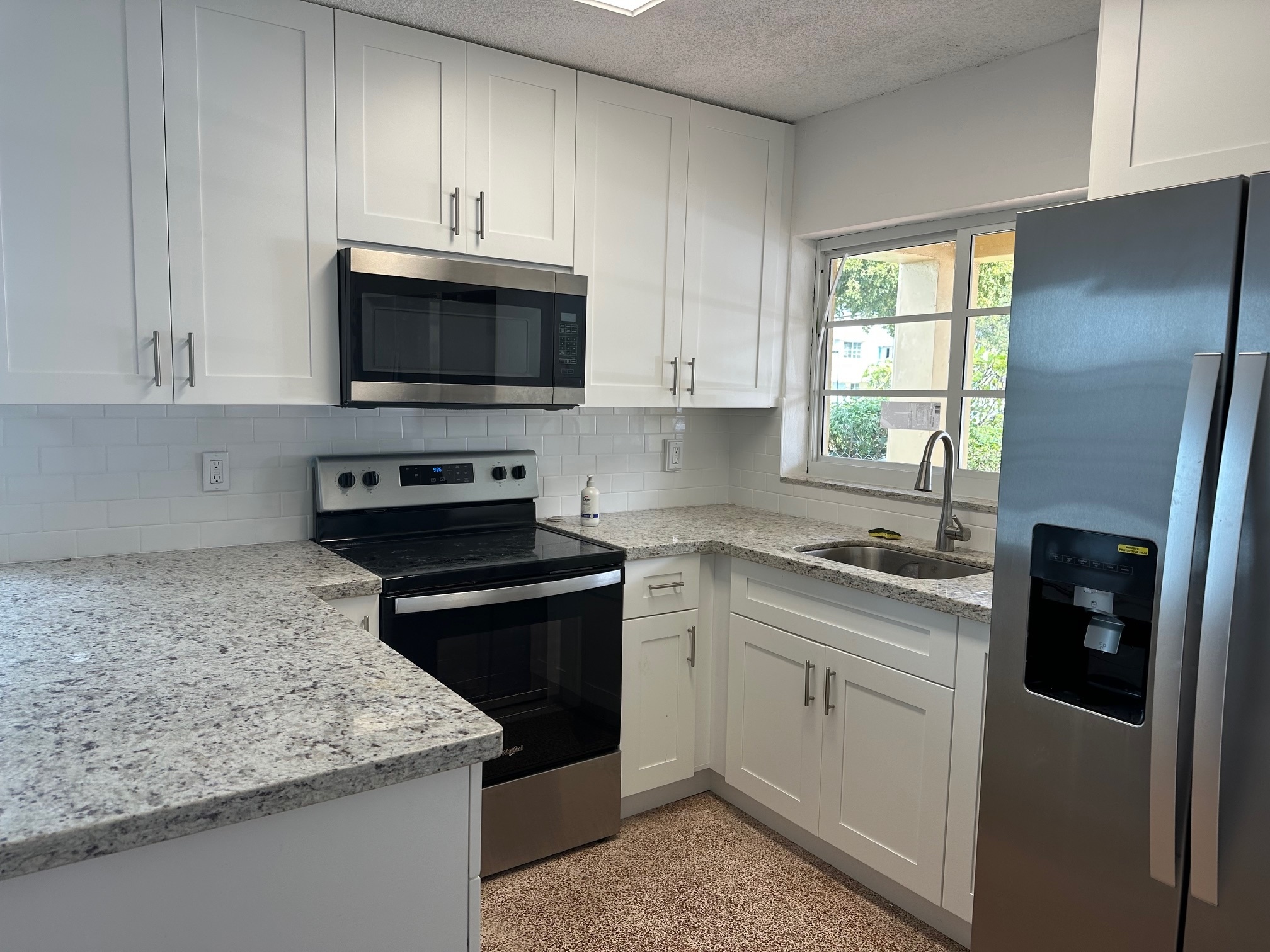 renovated granite kitchen - 610 SW 6th Ave