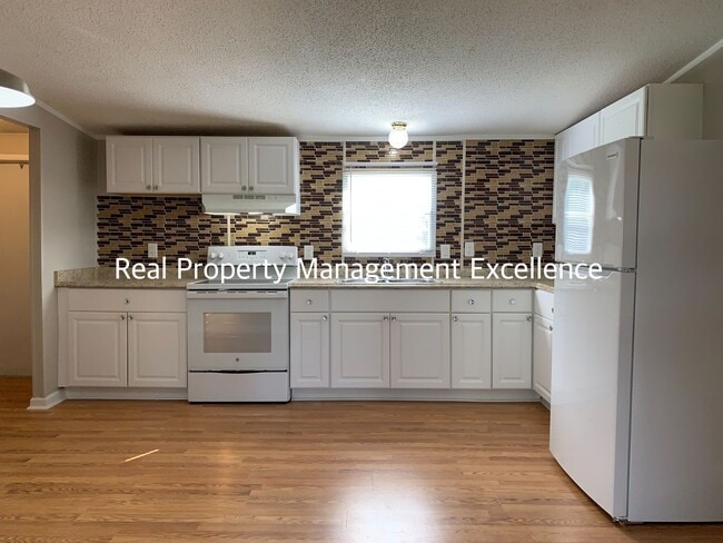 Building Photo - Quaint Renovated Home, Near Education Faci...