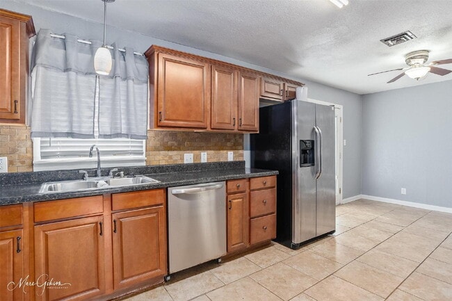 Building Photo - "Charming 3-Bed Oasis with 2 Baths on Joy ...