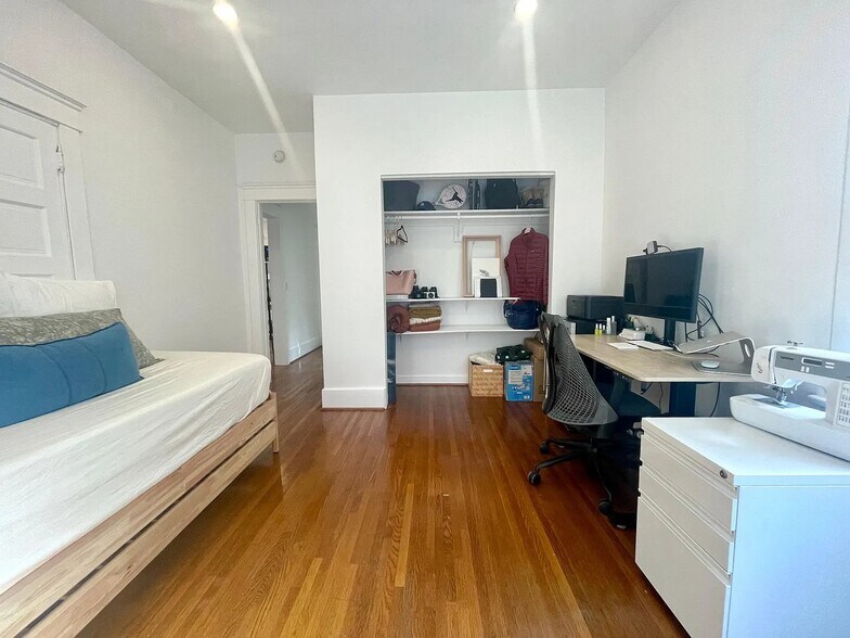 Large second bedroom that fits a desk or seating area comfortably. - 6000 Carlton Way