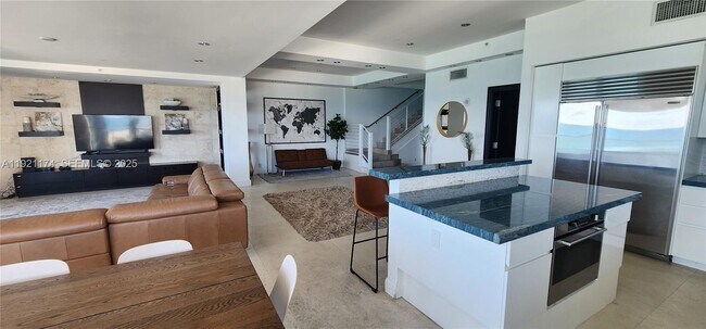 Building Photo - 9499 Collins Ave