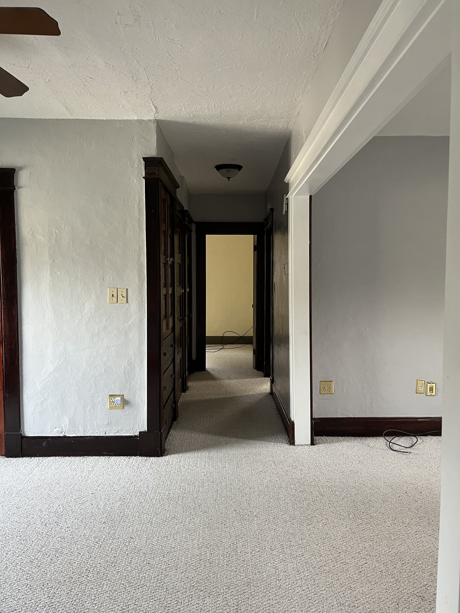 built in shelves and cabinet in the hallway - 325 S Main St