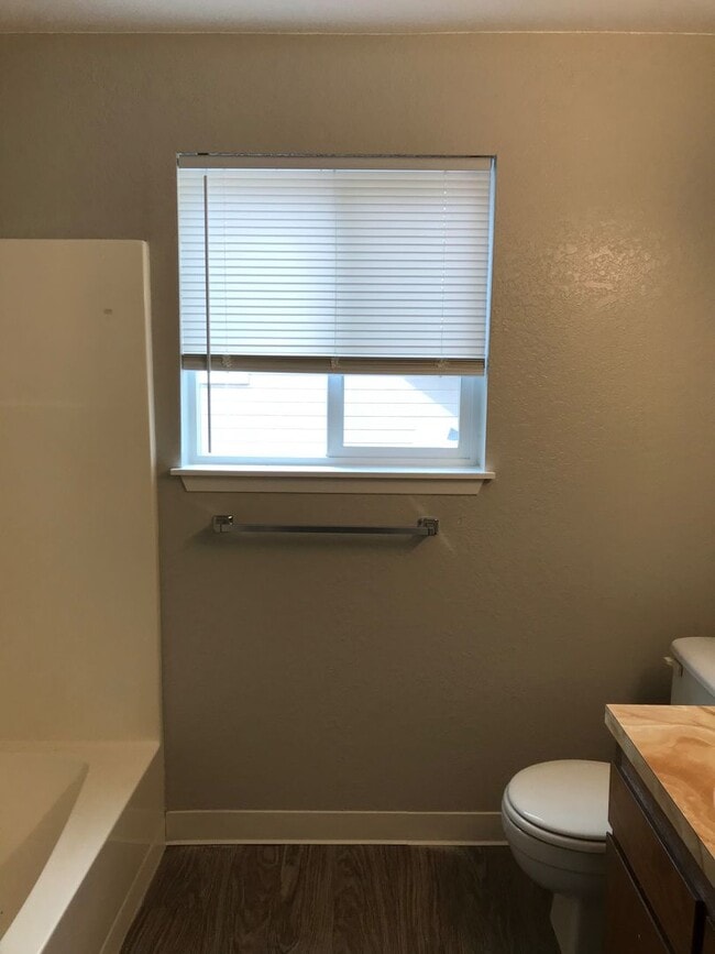 Building Photo - Updated 2 BR / 1.5 BA End Unit – Private Yard & Fresh Interior!