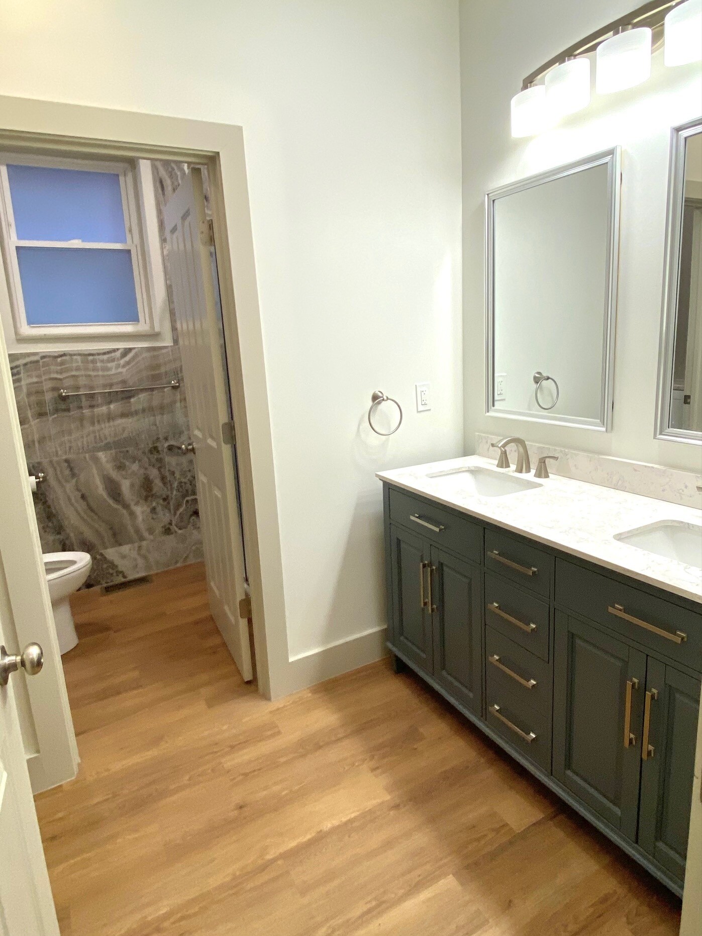 Bathroom 2 with twin vanities. - 1321 Highland St
