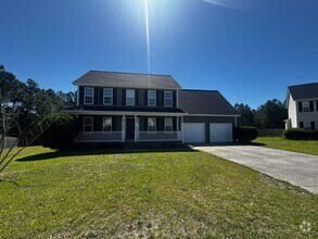 Building Photo - Spacious 3 Bedroom, 2.5 Bath Home with Bon...