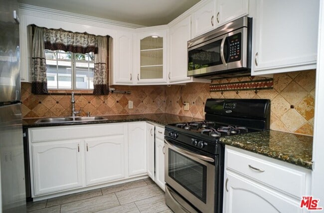 Building Photo - 6840 Nestle Ave