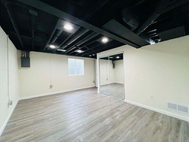 Building Photo - Spacious 4-Bedroom Home with Finished Basement & Attached Garage