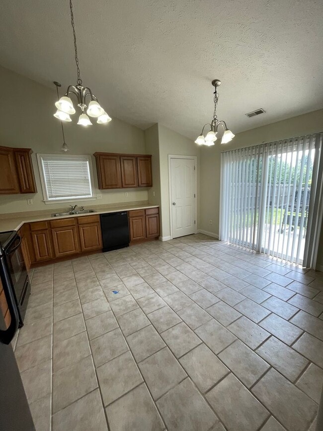 Building Photo - Three Bedroom Single Family Home - West La...