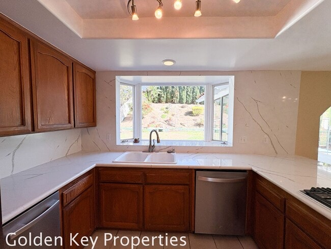 Building Photo - Welcome to this stunning 4-bedroom, 3-bathroom home located in the desirable La Costa neighborhoo...