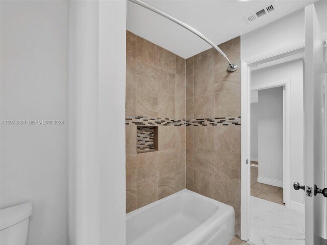 Building Photo - 10251 NW 39th Ct