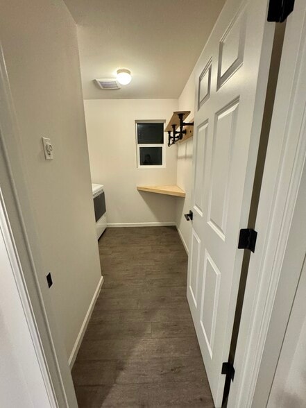 Large laundry room upstairs - 6750 Skipper Ln SE