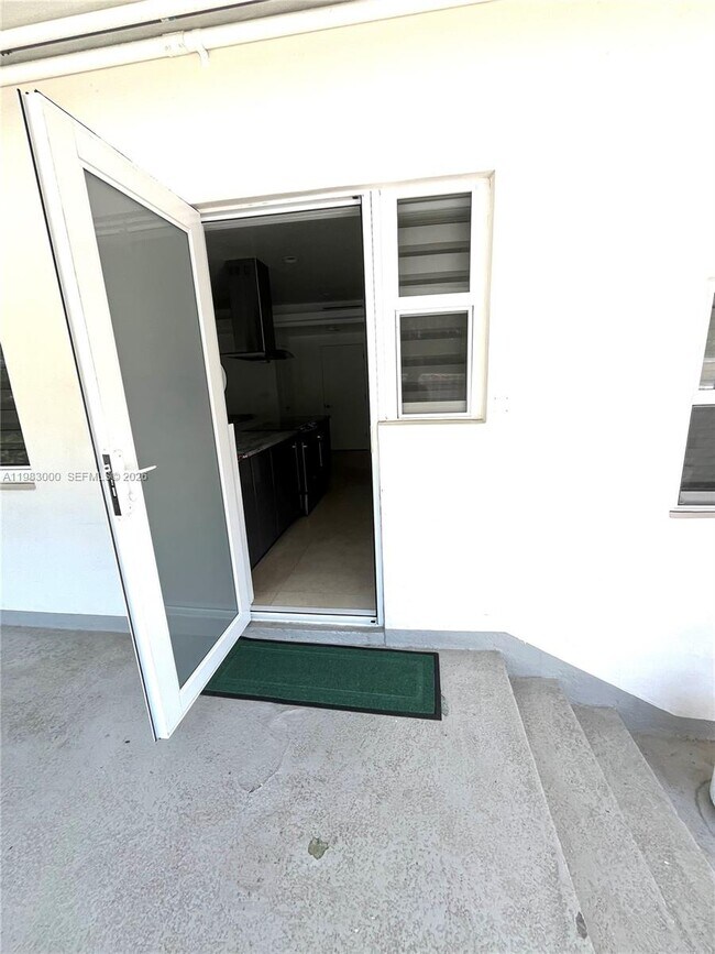 Building Photo - 10190 Collins Ave