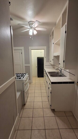 Full size refrigerator near kitchen - 819 N 5th Ave