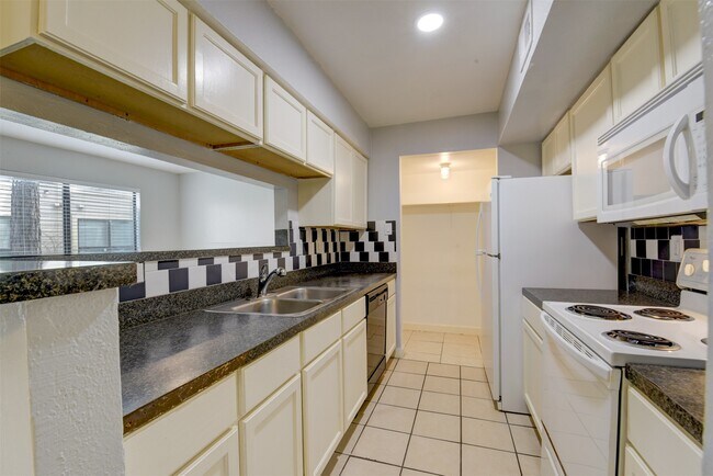 Building Photo - 7200 W T C Jester Blvd