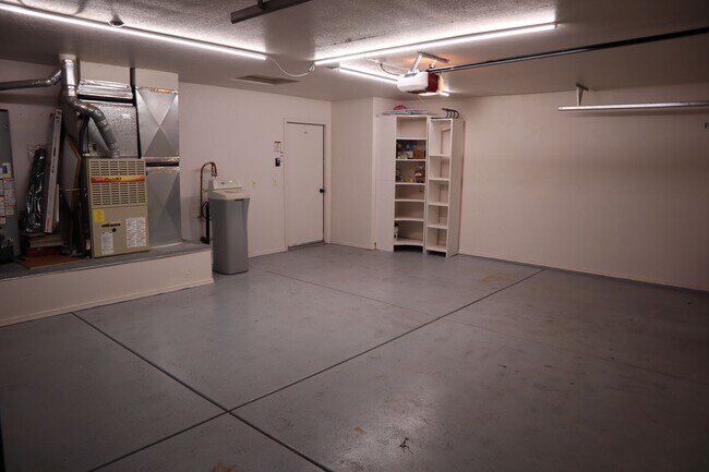 Building Photo - Home With A Pool and Much More!