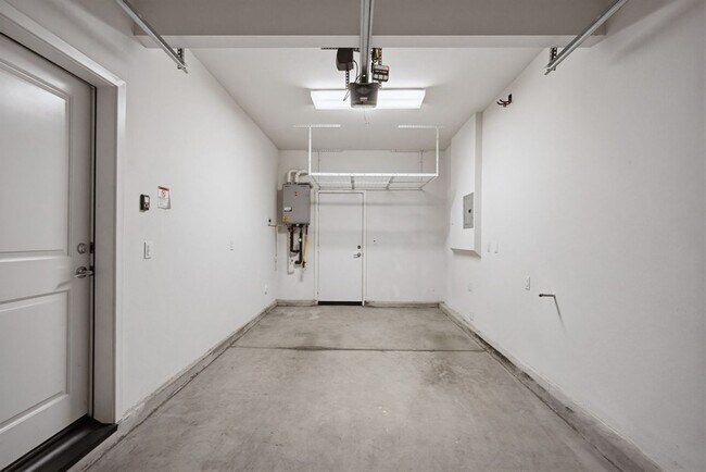 Building Photo - NEW LISTING 4 Bedroom, 3 Bathroom, 2 Garage Detached Condominium, with HVAC, Tankless Water Heate...