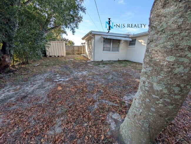 Building Photo - JUTS REDUCED!!!   3/1.5/1 1113 Sq. Ft. with UPDATED bathrooms and kitchen with GRANITE, LARGE bac...