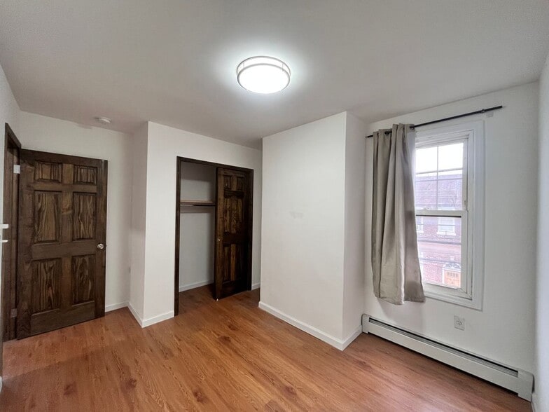 Building Photo - 64-03 Perry Ave