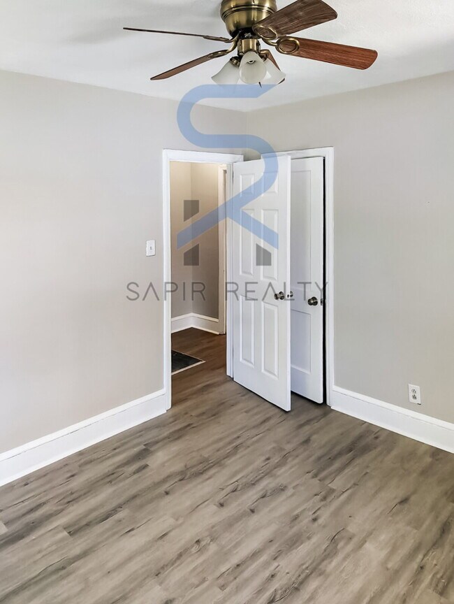 Building Photo - Move in before December 31st and choose your reward: a $250 Amazon Gift Card or a 55" Smart TV!