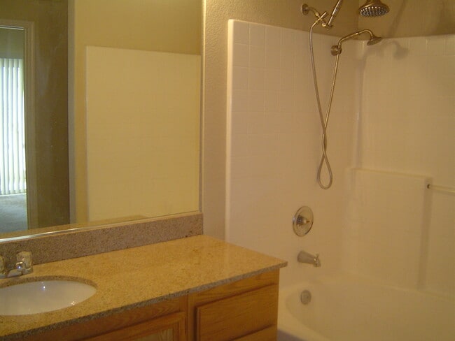 Building Photo - Move-In Ready Condo with Private Balcony & Modern Upgrades