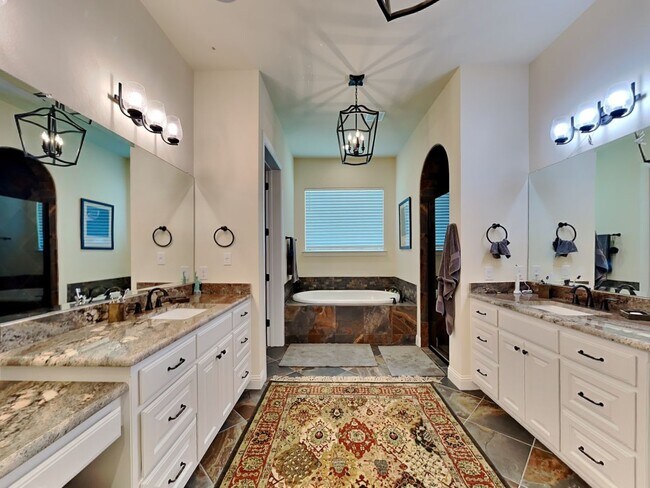 Building Photo - Experience Resort-Style Living in the Prestigious Gated Community of Bella Flora.