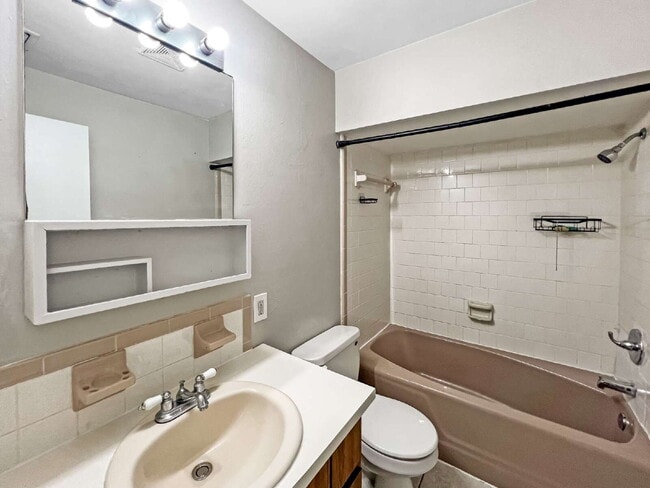 Building Photo - Budget-Friendly. Bold Personality. Big Coz...