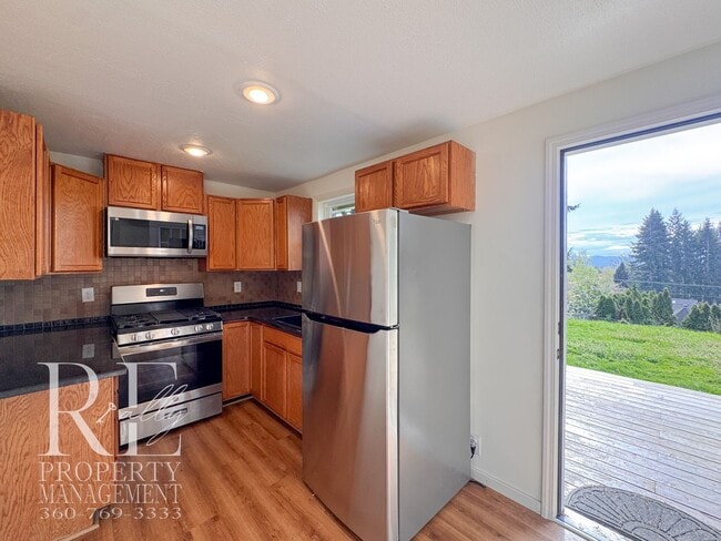 Building Photo - Private Retreat with Expansive Yard & Loft Space