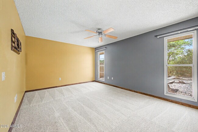 Building Photo - 9847 W Wrangler Dr