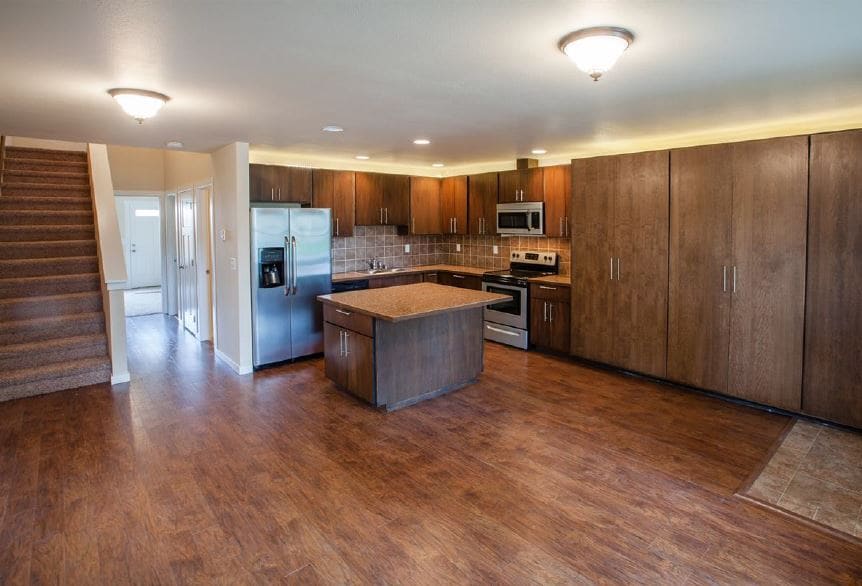 Kitchen/Family Room open concept. Tons of kitchen storage and floor to ceiling cabinet storage. - 1220 W Bismark Ave