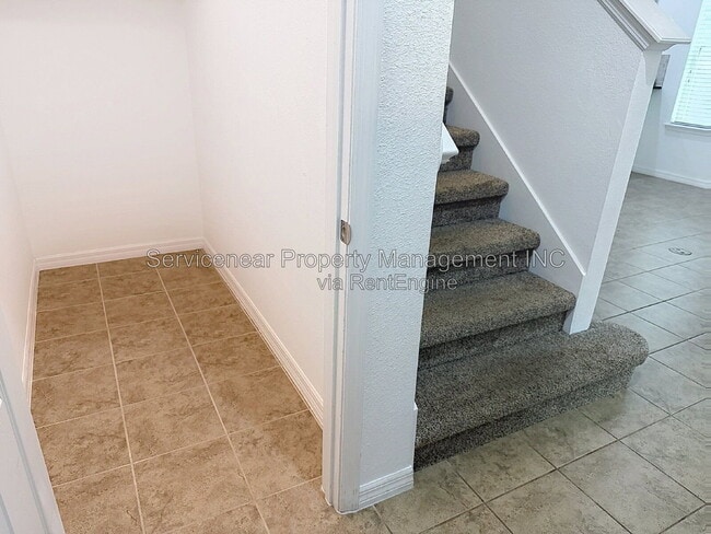 Building Photo - 9428 Woodcrane Dr