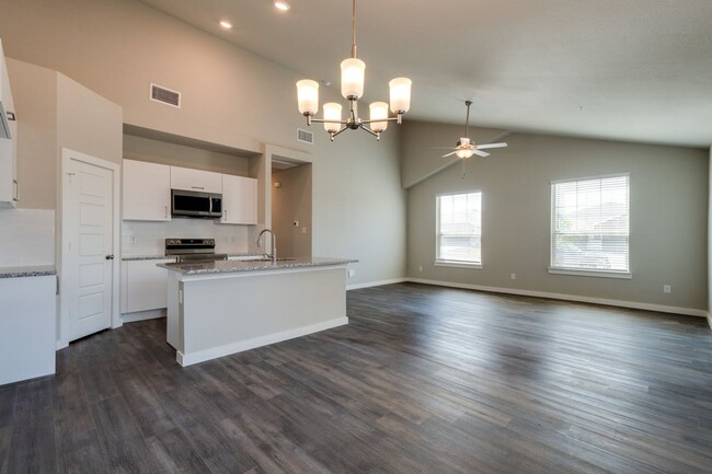 Building Photo - GORGEOUS 3 BEDROOM FOUR PLEX LOCATED IN MI...