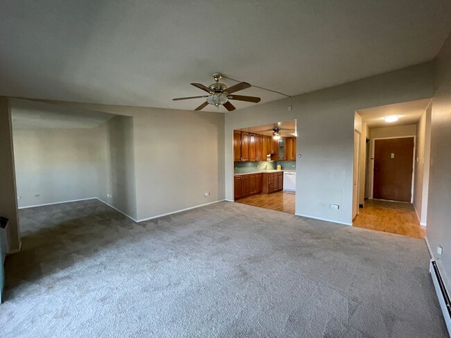 Building Photo - Spacious Top-Floor Condo in 55+ Community