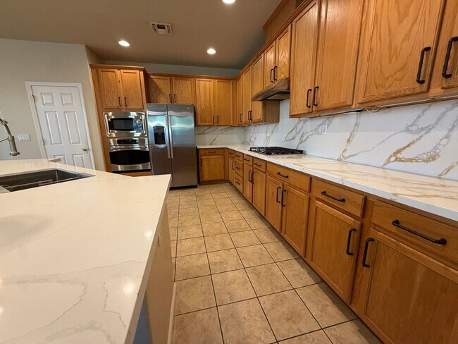 Building Photo - Spacious 4-Bedroom Elk Grove Home with Updated Kitchen, Quartz Countertops! VIEW TODAY!