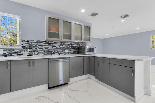 Building Photo - Northwest 196th Street, Miami, FL 33169 - 4 BR 2 BA house
