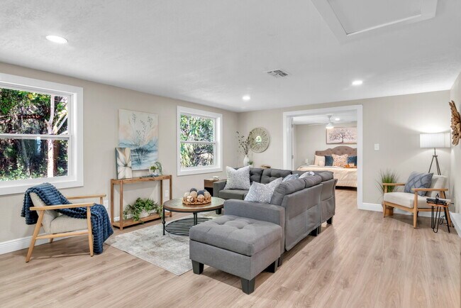 Building Photo - A spacious 3-bedroom, 2-bath layout provides plenty of room for family and guests!