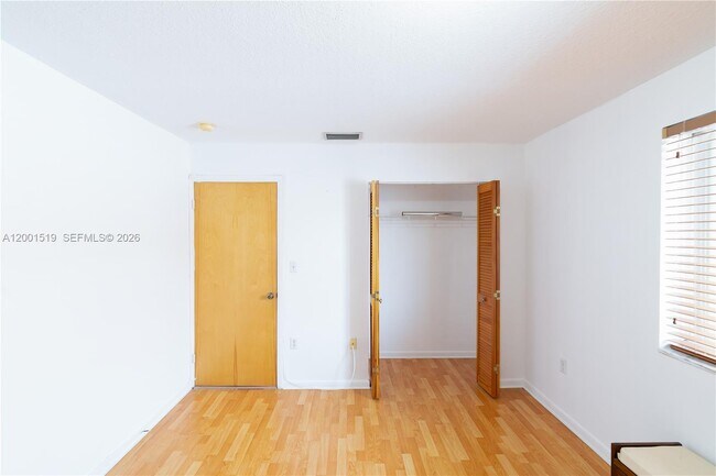 Building Photo - 10017 W Okeechobee Rd