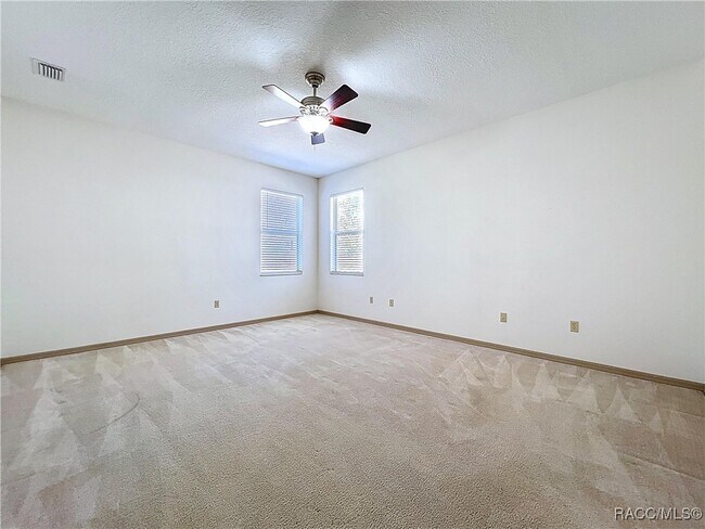 Building Photo - 5950 N Petunia Terrace