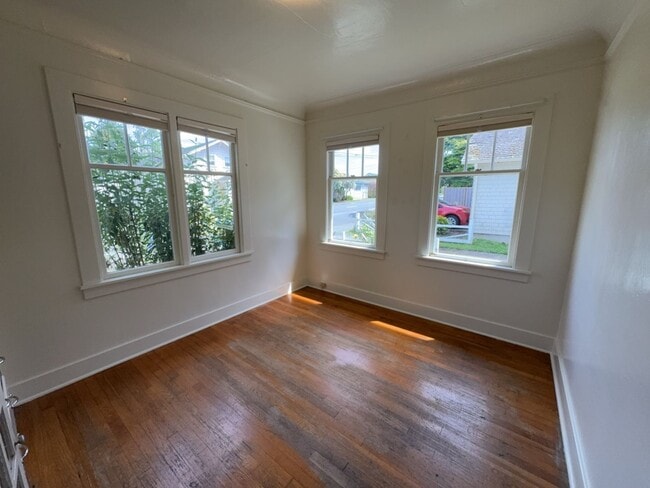 Building Photo - Sit out with your pet on the patio of this...