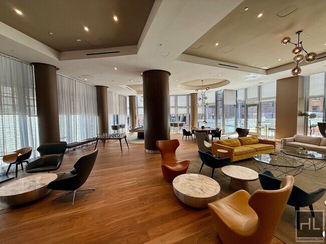 Building Photo - SUNNY NO FEE STUDIO IN THE LUXURY SUMMIT NYC