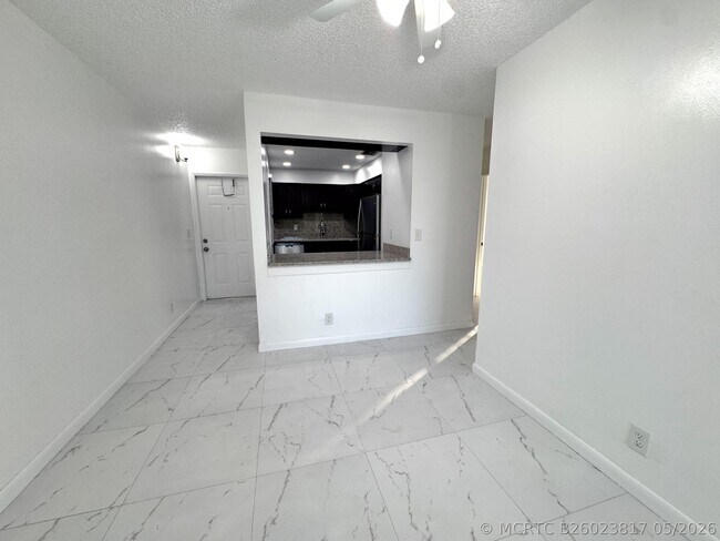Building Photo - 10687 Royal Palm Blvd