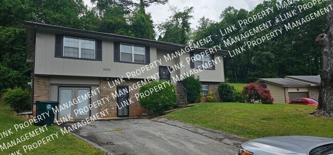 Building Photo - Coming in July!  Don't miss this Large 3 or 4 bedroom 2 full baths near Hwy 153/58.