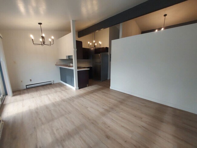 Building Photo - North Seattle 1BR with Private Balcony, Natural Light, and Modern Flooring