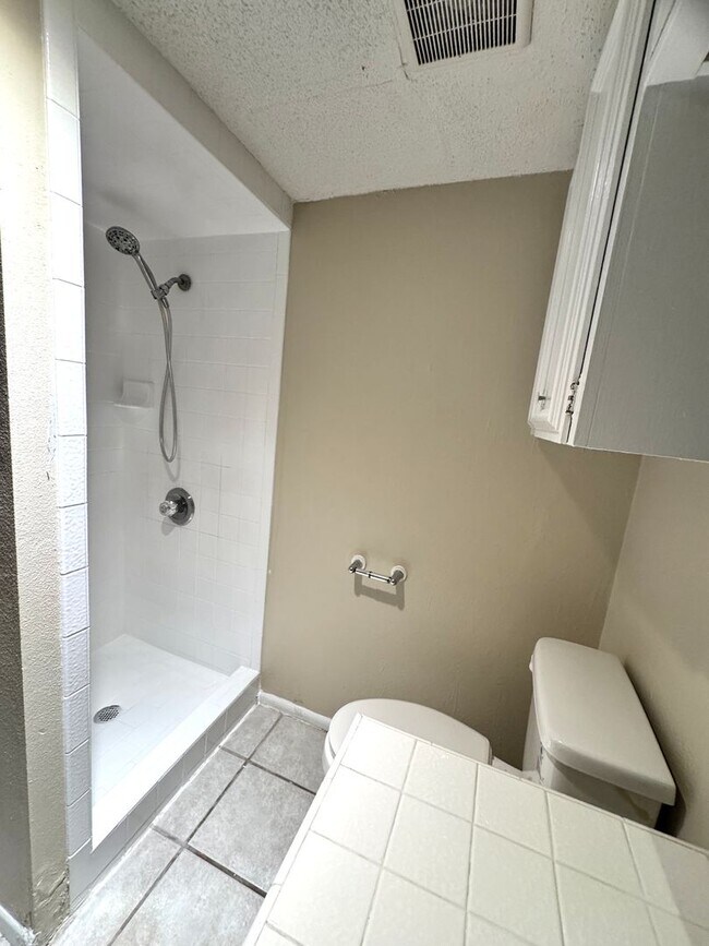 Building Photo - Single-level living on ground floor  |  Fresh paint (July 2026)  |  2 carports  |  Community Pool...